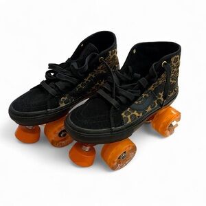 Black and Leopard Print Roller Skates with Orange Wheels